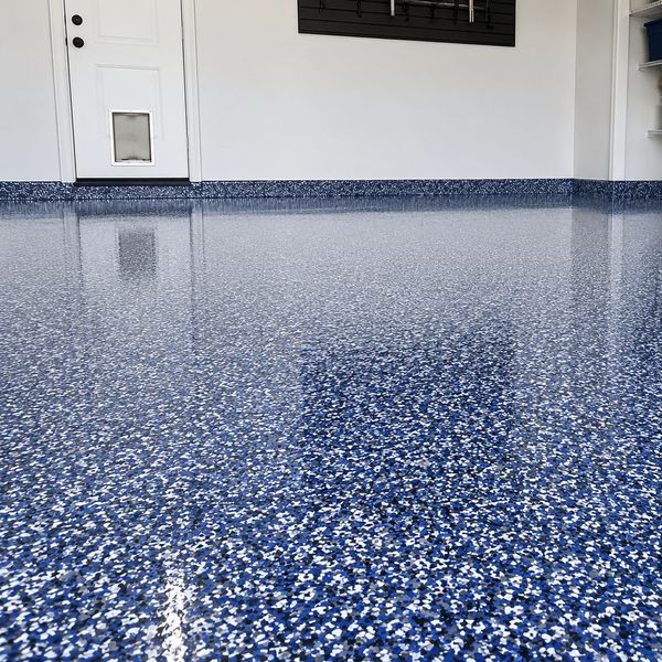 Glossy blue and white speckled epoxy floor in a clean room.
