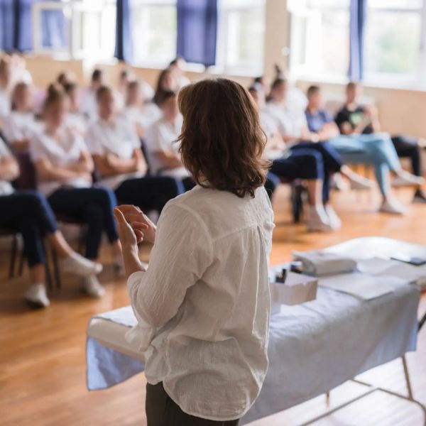 Professional trainer leading supportive learning session