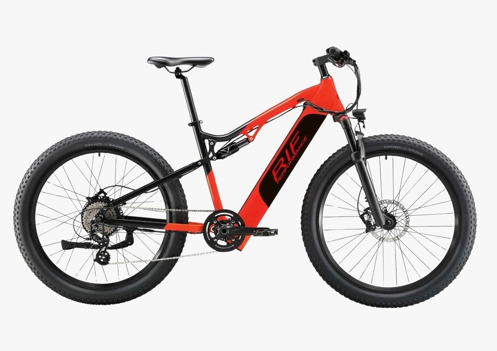 Red and black mountain bicycle with thick tires.