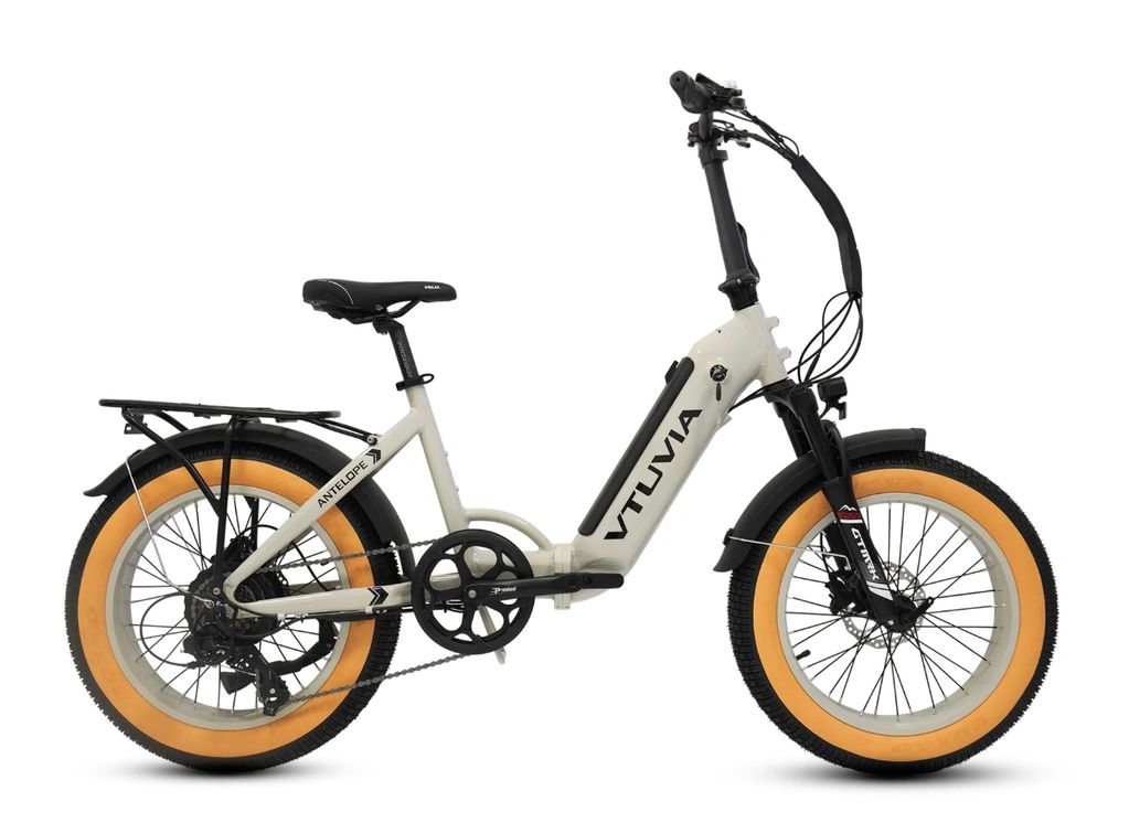 White electric bike with orange tires and black accents.