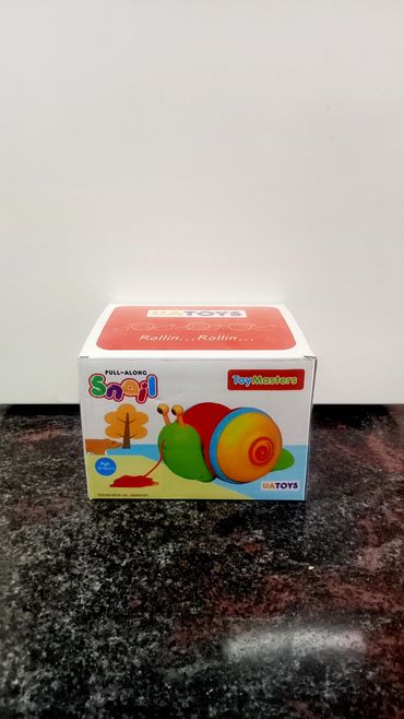 Colorful pull-along snail toy box from ToyMasters.