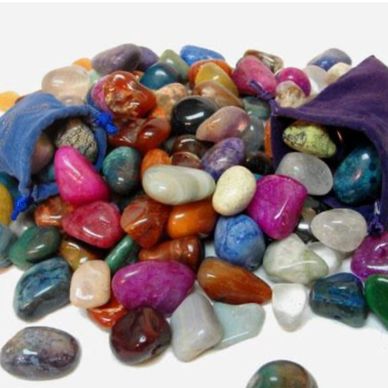 Fill a bag of tumbled stones, magnet stones or glow in the dark stones in a faux leather bag!