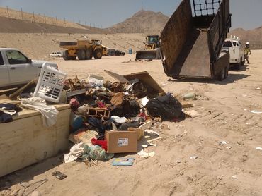 Dumping trash at San Bernardino landfill