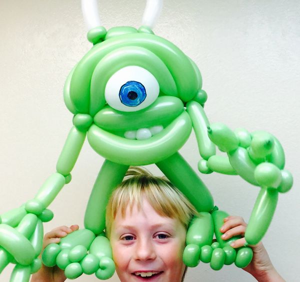 A green monster balloon animal