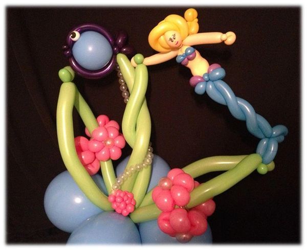 A balloon sculpture of a mermaid under the sea