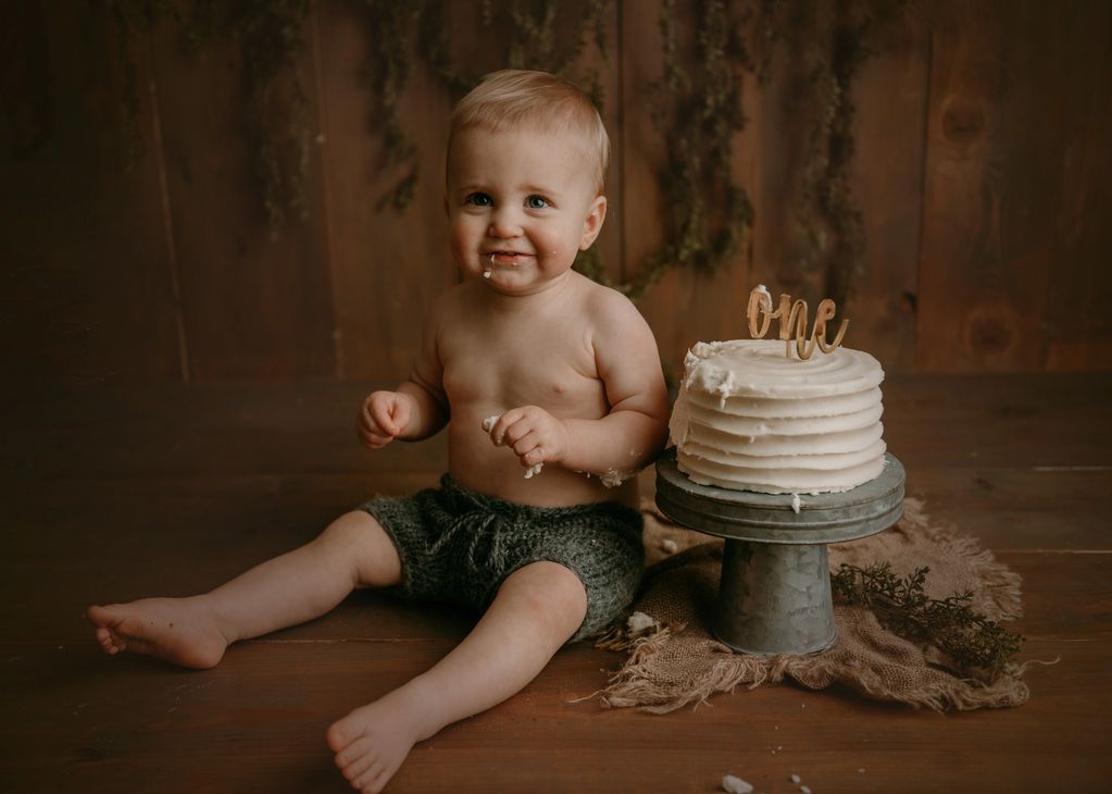 baby boy with cake smash
birthday cake
one year session
