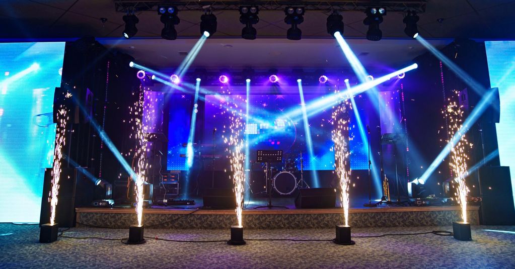 Stage with LED Wall/lights and Sparklers with instruments set up. 