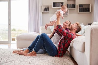 Family enjoying cooling with small child.