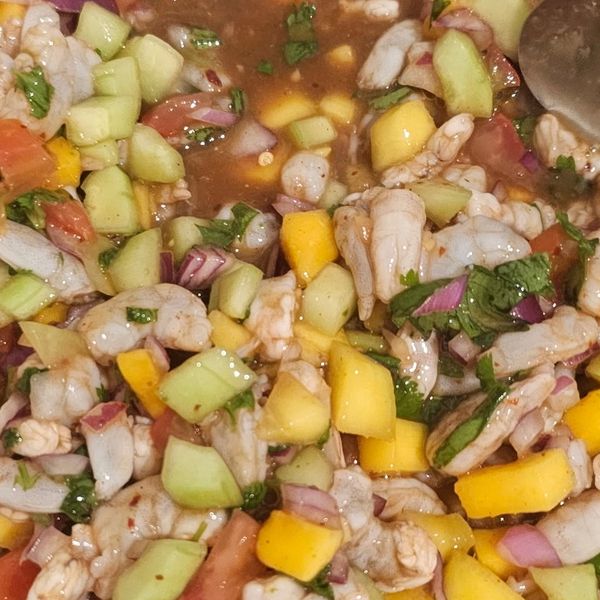 Fresh shrimp ceviche with mango, cucumber, and herbs.
