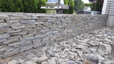 Stone retaining wall.