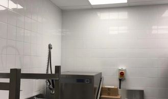 Mastic sealant works to kitchen in restaurant.