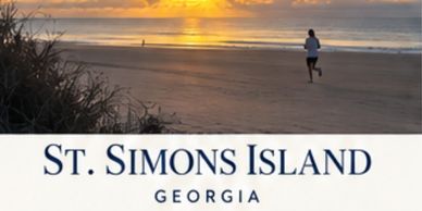 Sunset jogger on St. Simons Island beach in Georgia.