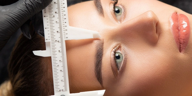 Measuring eyebrow for cosmetic tattooing, such a microblading and ombre