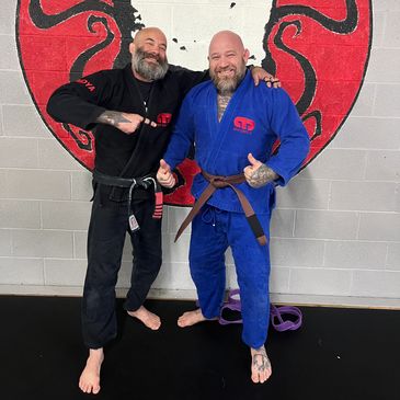 Neil Capra after receiving his brown belt from 4 stripe black belt Professor Jason Bircher