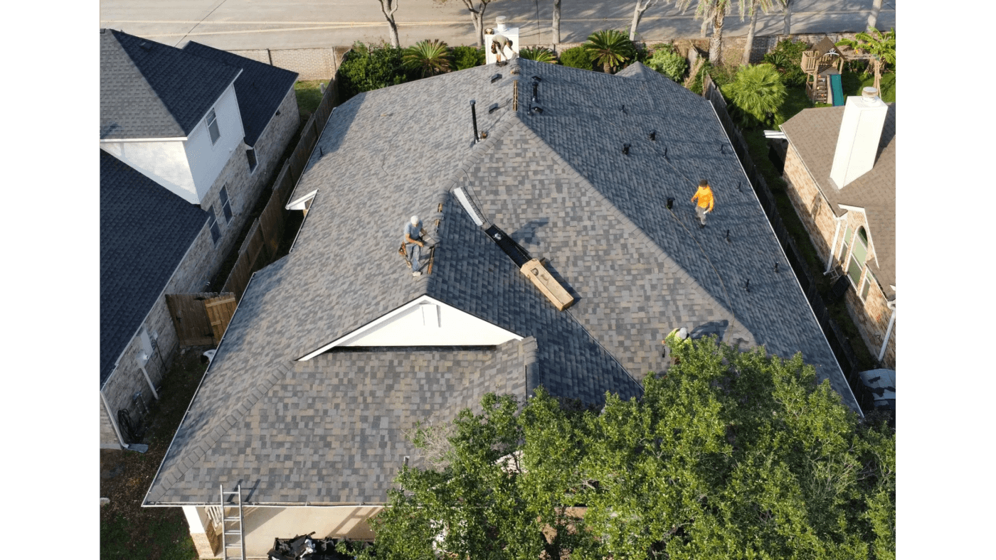 Aerial view of a completed architectural shingle roof on a Texas home
