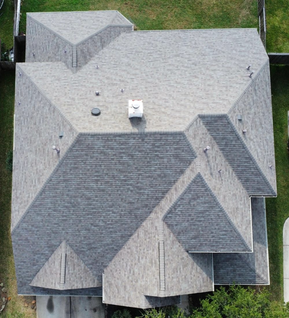 Drone view of a completed residential roof replacement