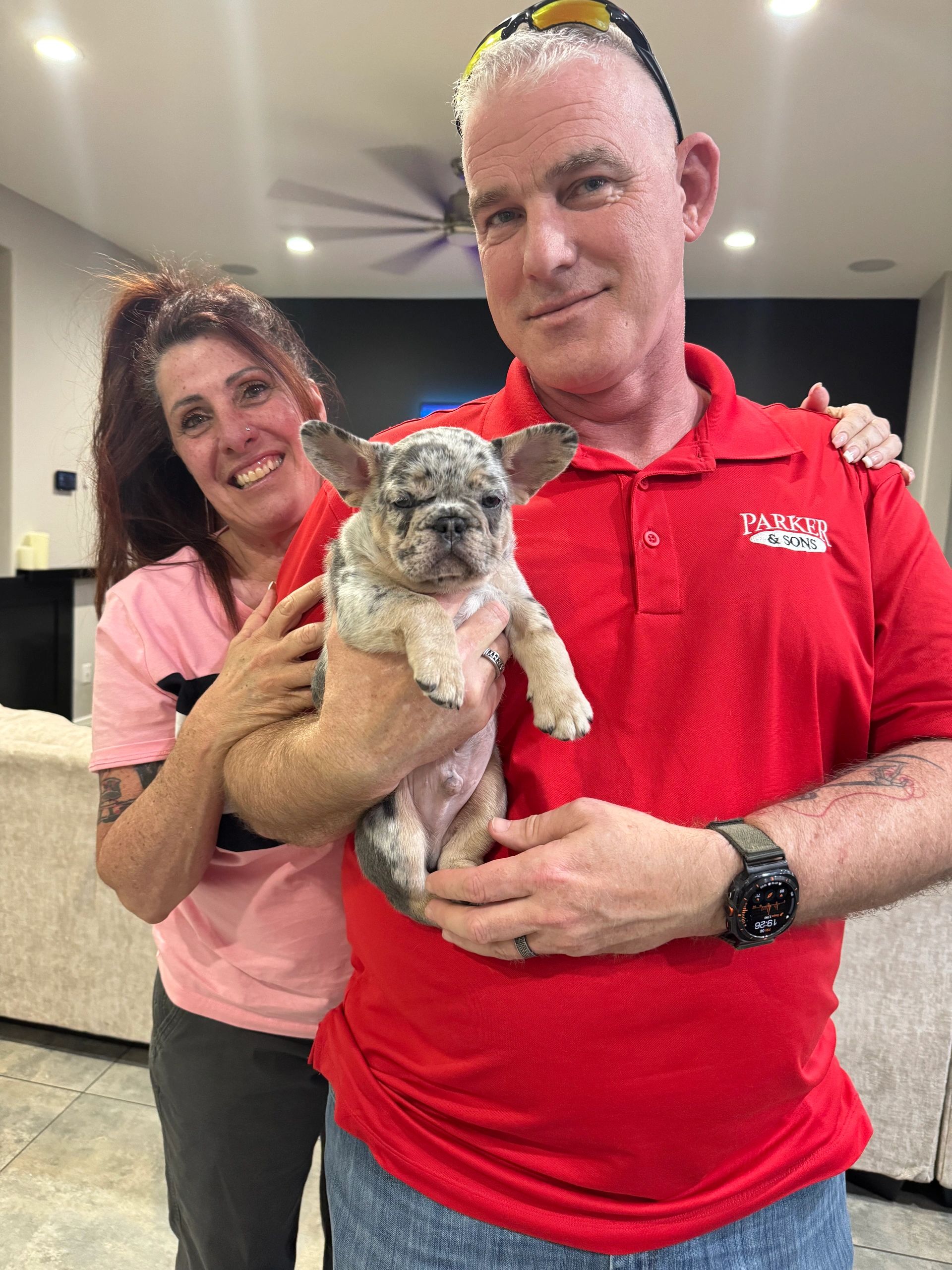 Happy family with their new AZ Freedom French Bulldog