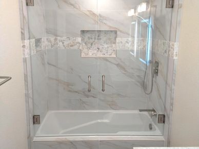 Picture of acrylic bathtub and glass shower enclosure