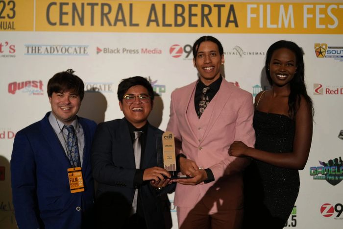 Kingley Odera with his Director, Riggs Vergara and their significant others celebrating their win of