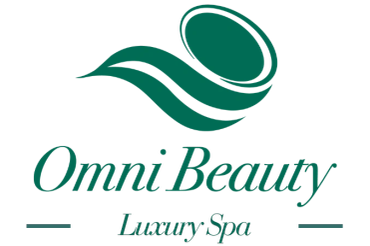 Omni Beauty Luxury Spa logo with green text and design.