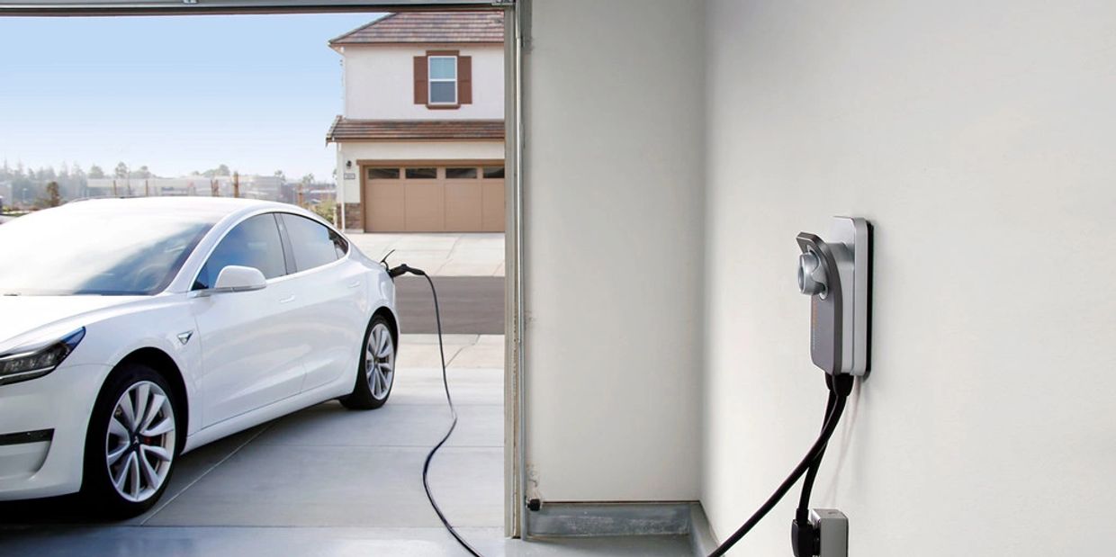 EV charger installation in Roswell by Breaker Brothers Electric with a car charging