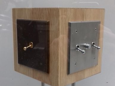 A sculpture using light switches