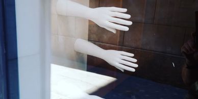 Mannekin hands in a window