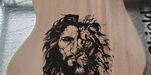 Laser engraving on guitar body