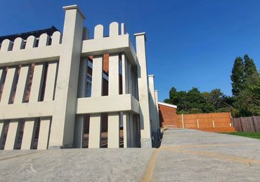 Close up of white picket fence