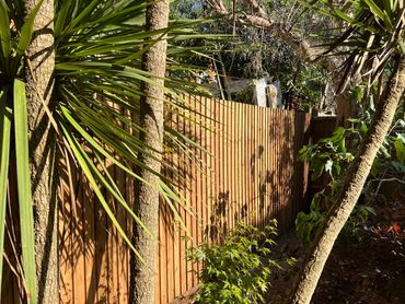 Featheredge fencing with timber gravel boards