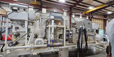 Industrial machinery in a large warehouse.