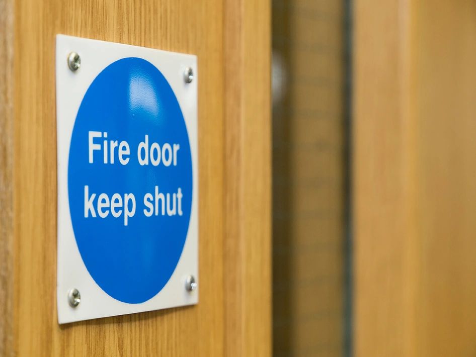 Fire Door sign on an office fire door