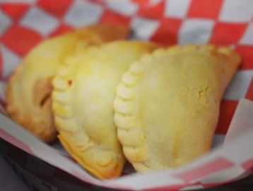 Hand-folded empanadas filled with tender, seasoned chicken and baked to golden perfection — a comfor