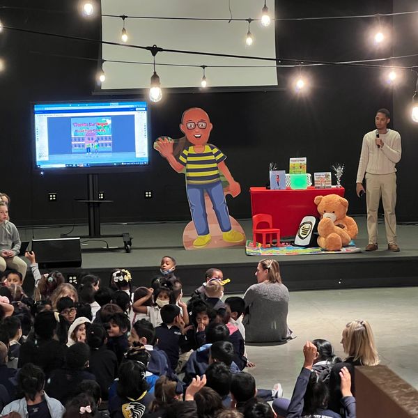 Franklin speaking on the stage on the display