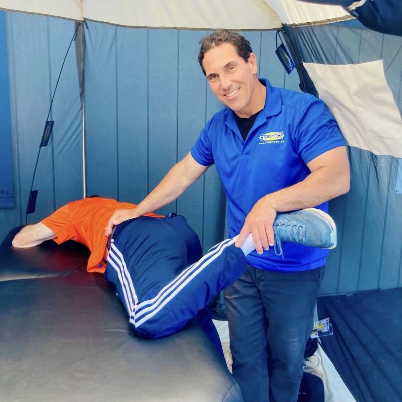 A Man Getting a Massage in a Tent