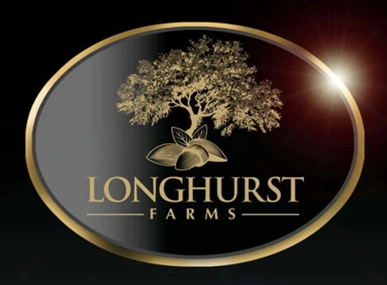 Elegant Longhurst Farms logo with a golden tree and nuts on a black oval background.