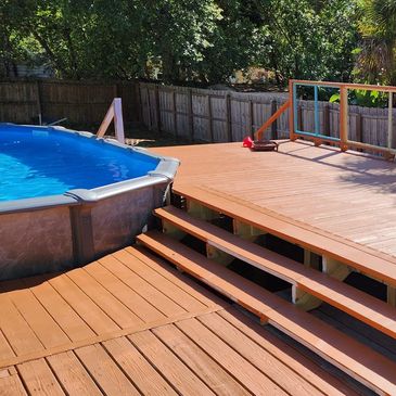 Beautiful swimming pool, deck and privacy fence.
