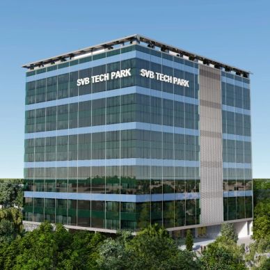 Modern glass office building labeled SVB Tech Park.