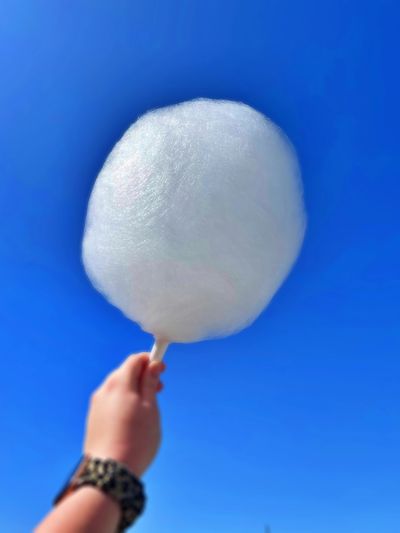 A cotton Candy Cloud against a bright blue sky