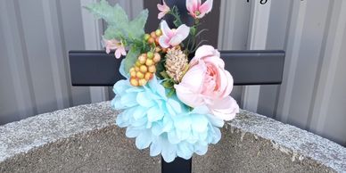 18" smaller cross for remembering baby or infant.  Power coated to protect from the elements