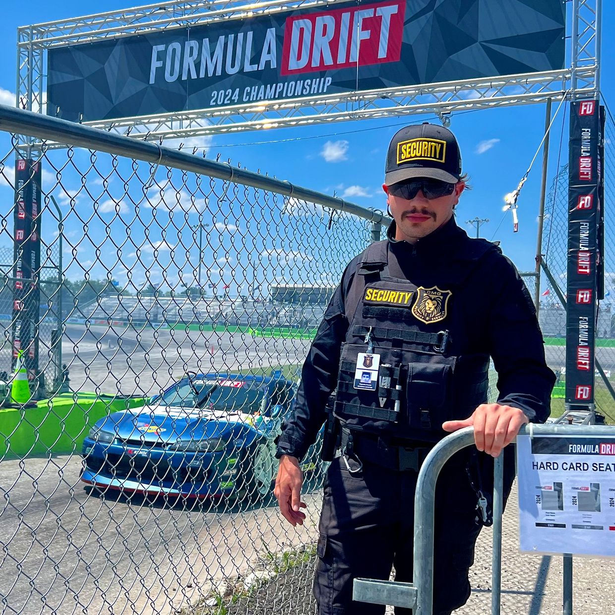 CMG Security officer at formula drift Orlando speed world event in the front of the oval track.