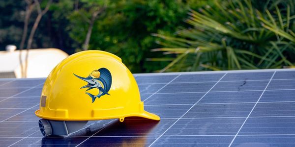 A yellow helmet with Sailfish Solar's logo