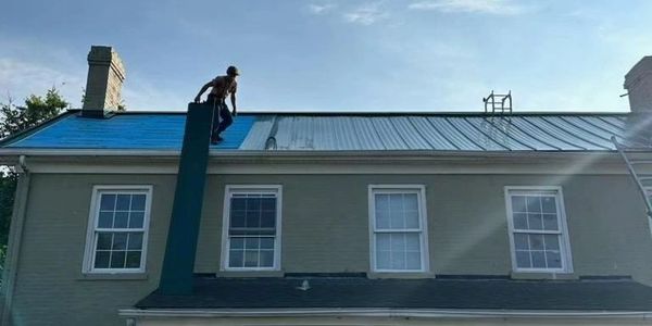 Man working on roof