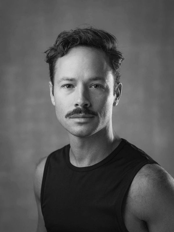 Oliver Halkowich leads a ballet class for adult and teen dancers.