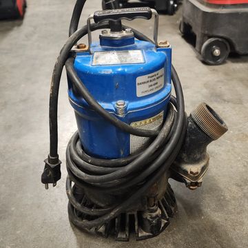 2" submersible pump. With discharge hose