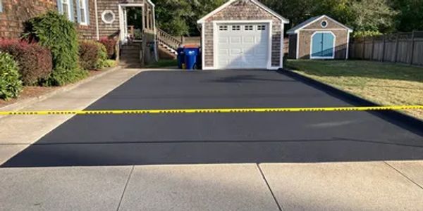 Professional commercial sealcoating services in Oklahoma City parking lots and asphalt maintenance.