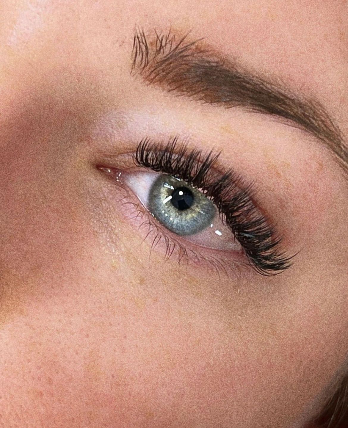 Woman having Eyelash Extensions, Classic extensions and Volume