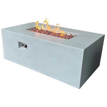 Modern rectangular outdoor fire pit with flames and lava rocks.
