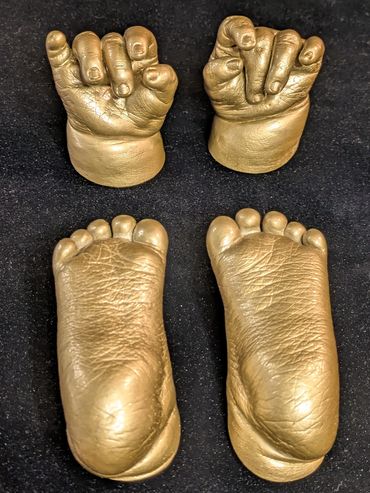 Champagne coloured memorial hand and foot casts for a 5 1/2 month old baby.