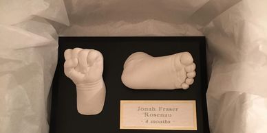 Packaged baby hand and foot casting ready for delivery